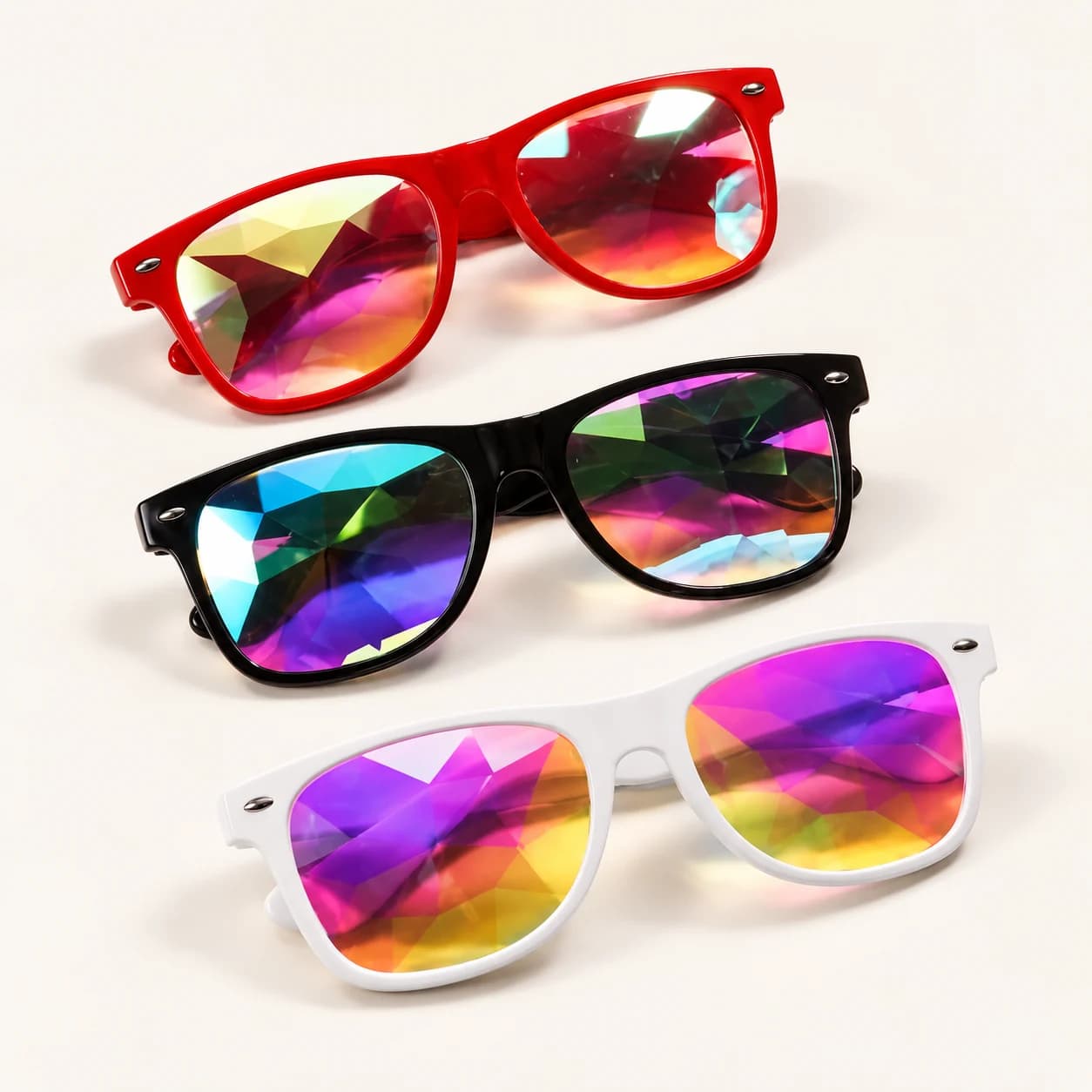 Vaporwave Glasses shown in red, black and white frame options with faceted rainbow lenses Vaporwave Glasses shown in red, black and white frame options with faceted rainbow lenses