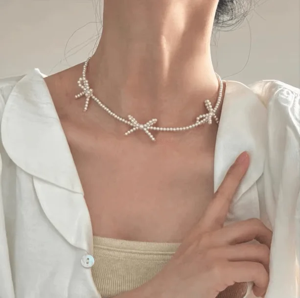 Pearl Bowtie Necklace — view 2 Pearl Bowtie Necklace — view 2